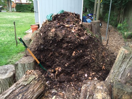 I've toppled the log walls that contain my pile to gain access to the right side.